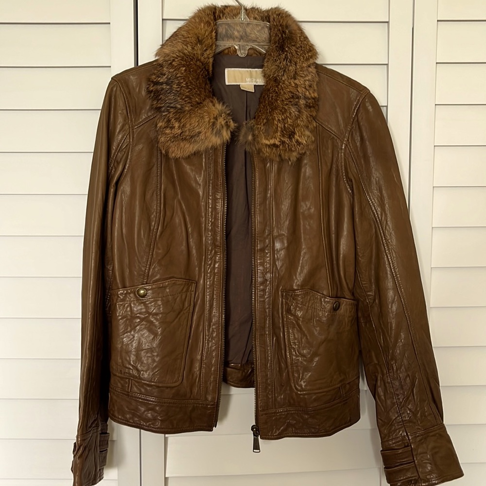 Leather Jacket. Michael Kors. Size medium. Runs small.  Collar is real fur.